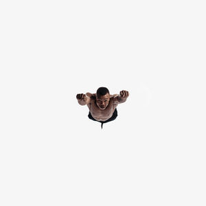 Man diving, arms outstretched
