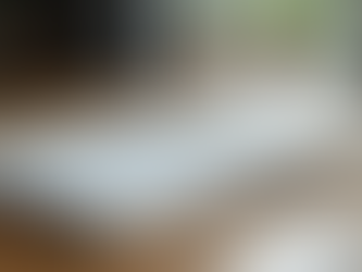 A notebook with coaching notes on a wooden table