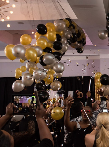 balloon-drop-chicago-herstory-balloons-black-silver-gray-gold-falling-raining-party.jpg