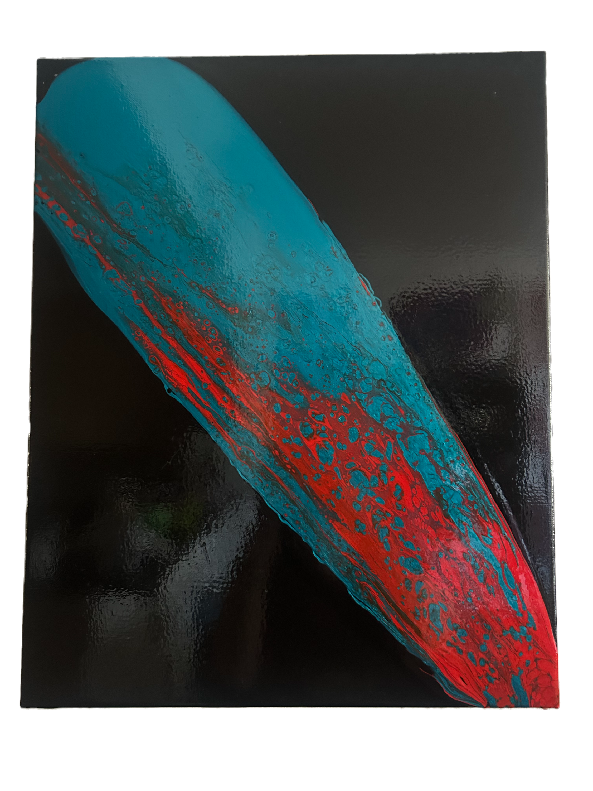 Abstract teal and red Ass Paddle design on black background
