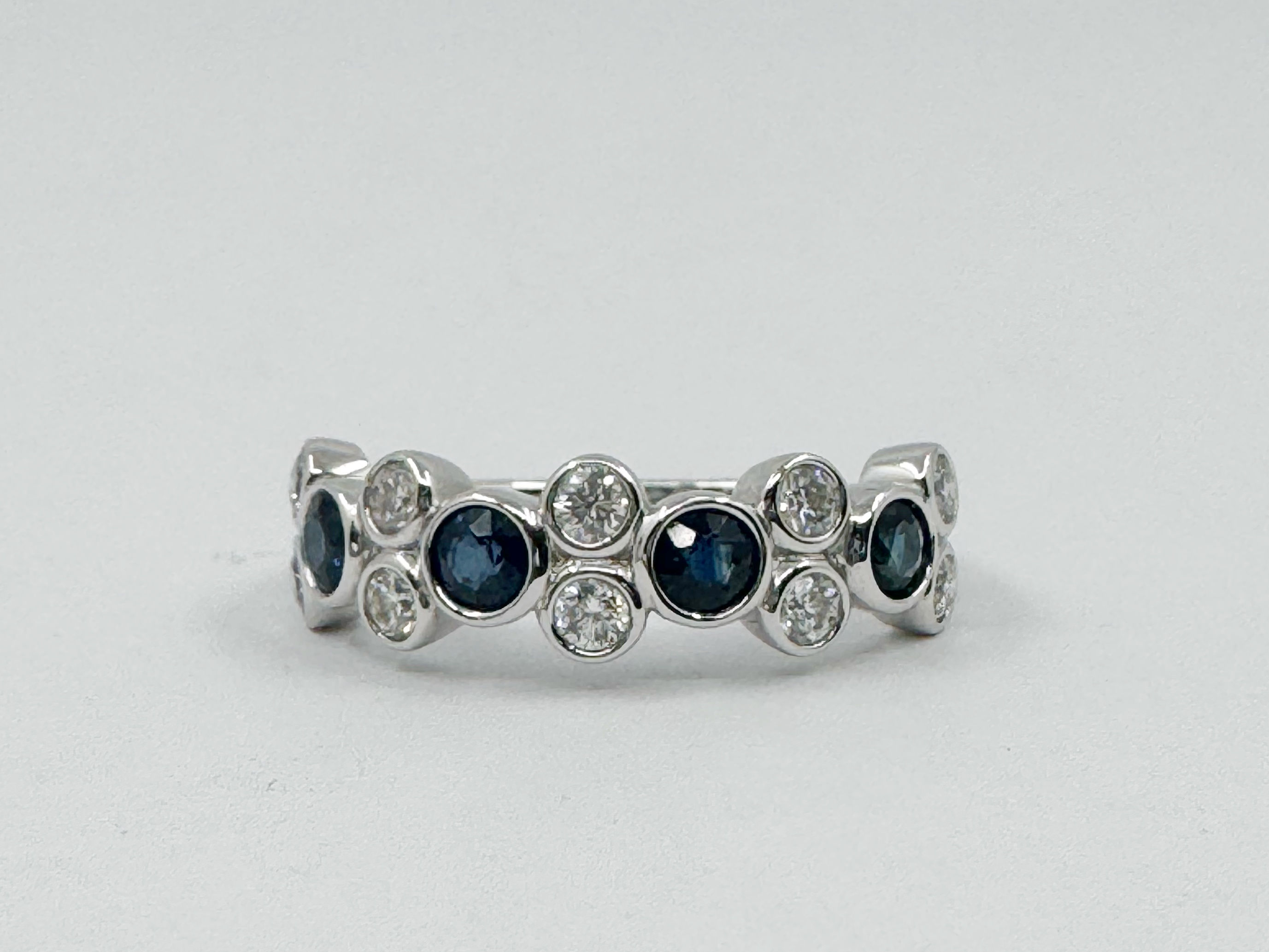 18ct white gold, sapphire and diamond ring - finger size N