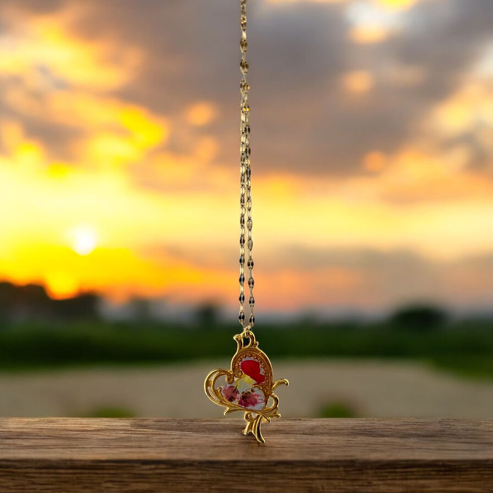 Heart resin necklace encapsulating real pressed flowers