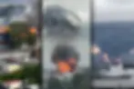 Captura de pantalla difuminada de un video de celular que muestra la silueta urbana de Moscú durante el día. En el fondo, grandes columnas de humo negro y gris se elevan hacia el cielo desde la zona de la refinería afectada.