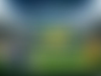 Airplane flying over stadium; soccer ball, passport, and World Cup trophy on field. Aer Lingus ad: 50% off new bookings for FIFA Cup.