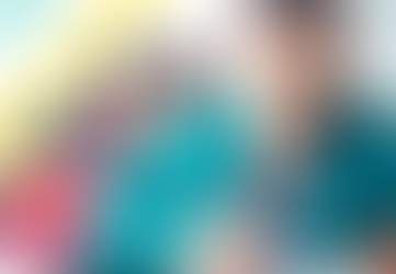 Teenagers sitting at a table studying for the ACT math section, working together on practice problems with notebooks, calculators, and textbooks open, showing focused expressions in a classroom setting.