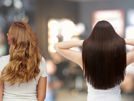 one woman with wavy hair, and another woman with straight hair