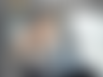 Executive Chauffeur Service - talking on phone - Dubai Airport Transfers - VIP - luxury cars