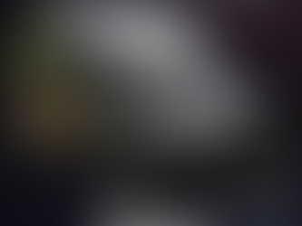 Black van with TrustiGo logo, reflecting trees, set against a starry background. Text reads: "Corporate Team Transfer Solution. Talk to us Now."