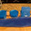 الصورة المصغرة: Blue resin coasters and soap dish on wood