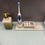Thumbnail: White epoxy bathroom set: soap dispenser, toothbrush holder, electric toothbrush