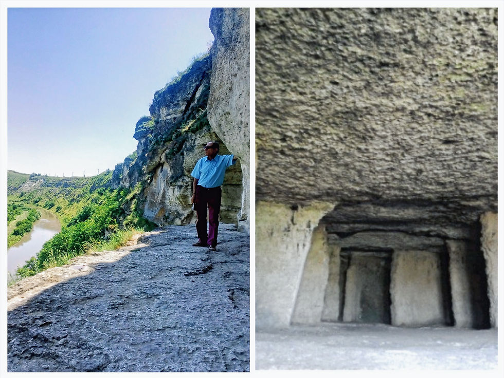 The hidden opening of the monastic cave and the monks' cells carved into the rock face