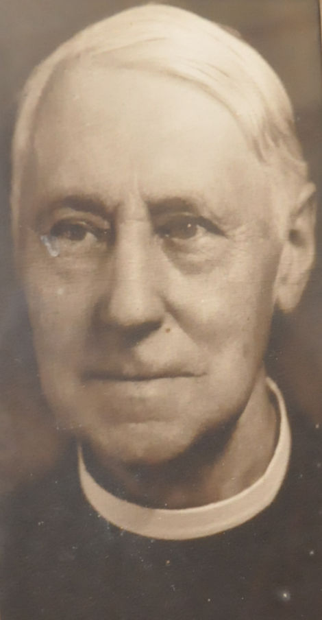 A picture of Armstrong Buck on the sacristy wall at Holy Triniy