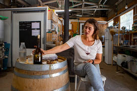 Winemaker Lital Ovadia with her 2020 vintage Petit Verdot in her Tel Winery in Moshav Sha'al in the northern Golan Heights.