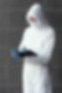 Asbestos Kent company personnel wearing PPE whilst carrying out asbestos testing and report