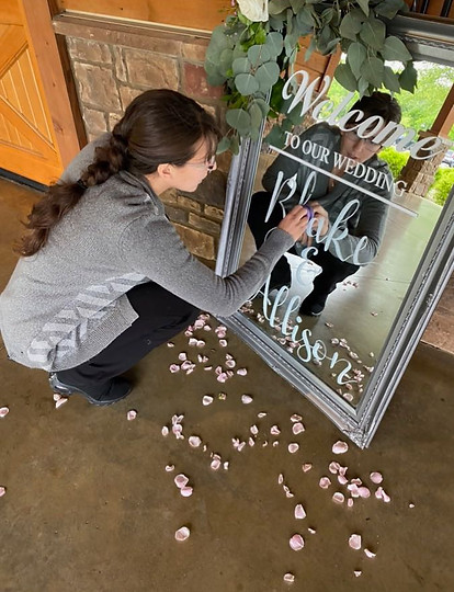 wedding-planner-wiping-mirror-nashville