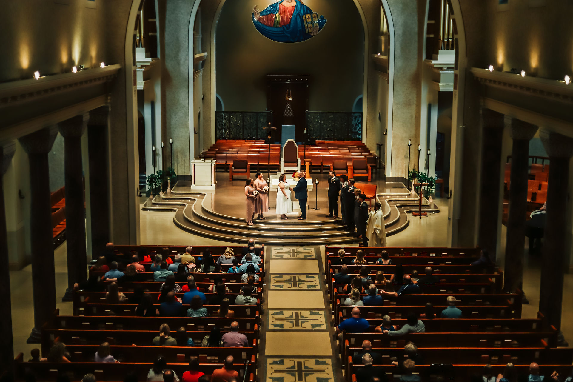A view of the wedding ceremony from the upper balcony
