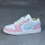 Thumbnail: Pink, white, and light blue Jordan 1 Low