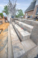 laying pavers for steps to platform