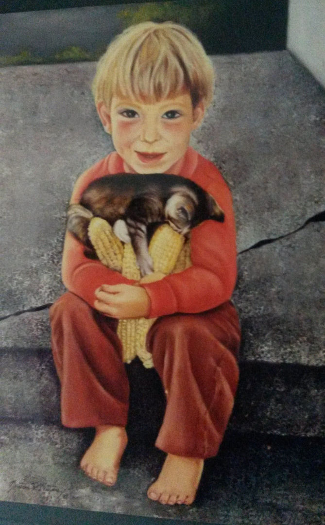 Menino loirinho e seu pet