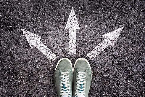 Shoes and arrows pointing in different d