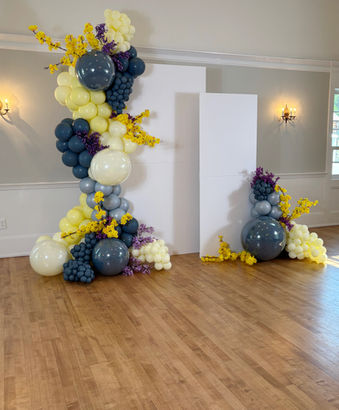 XL and medium white rectangle wood backdrops with organic navy and yellow balloon garland