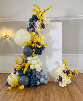 Vogue rectangle wood backdrop with organic balloon garland for a Long Island event