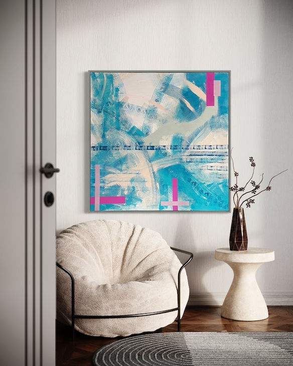 Rechteckiges abstraktes Bild im Wohnraum. Bild in türkis, pink und beige.