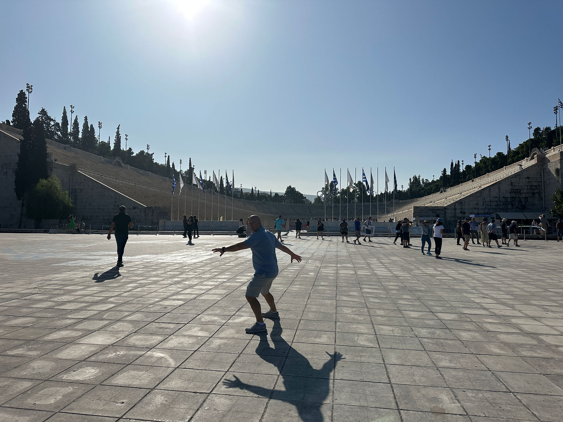 Man posing in front of Panathenaic Stadium