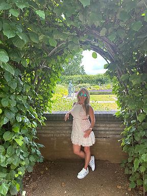 Person standing in front of the Sunken Garden at Kensington Palace