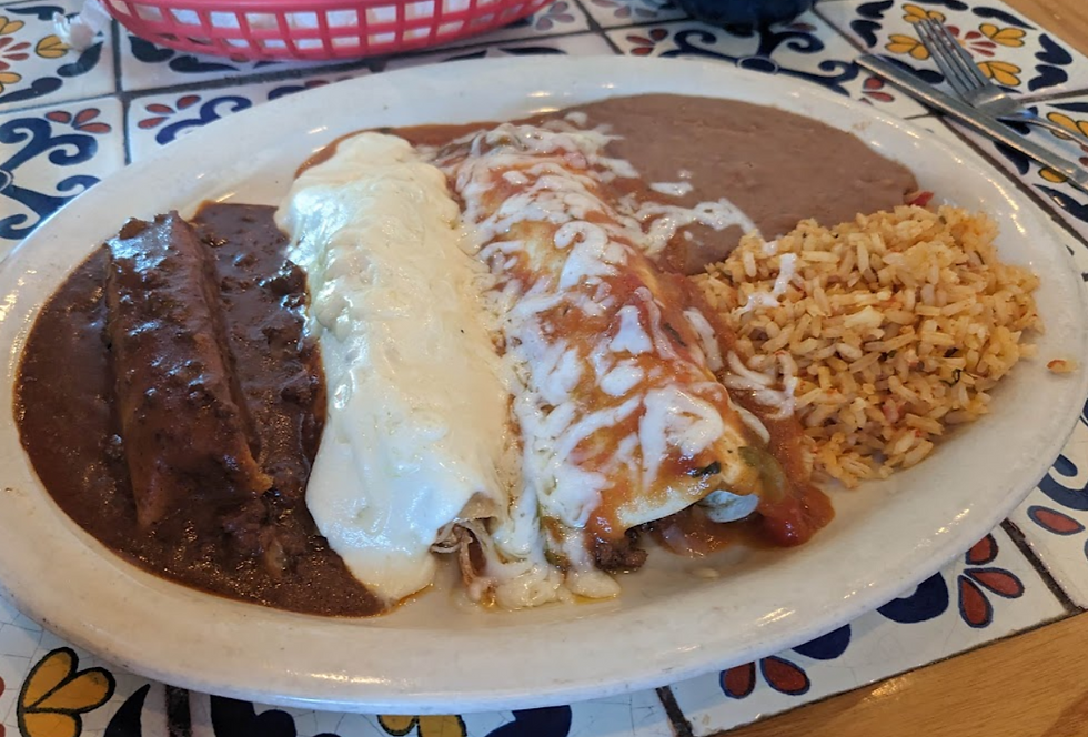 Enchiladas with refried beans and mexican rice