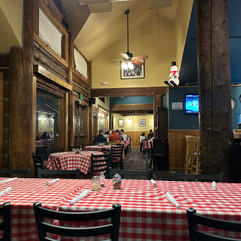 Small dining room with ride and white checkered table cloths at Michael's Italian in Breckenridge