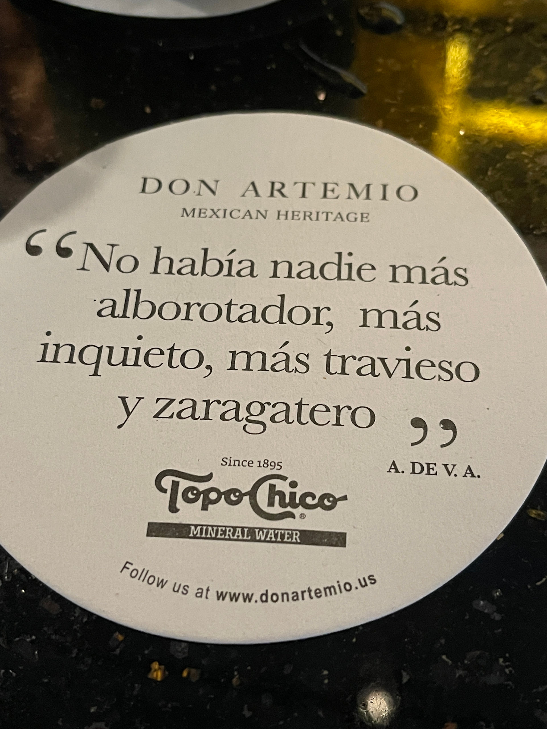 Coster with quote written on it "No habia nadie mas alborotador, mas inquieto, mas travieso y zaragatero"