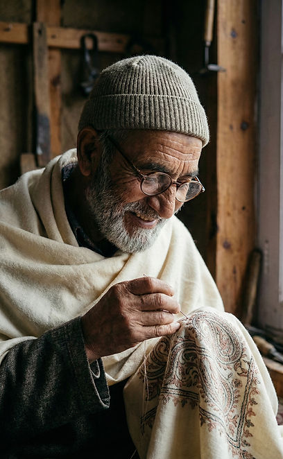 kashmiri artist working on a pashmina shawl