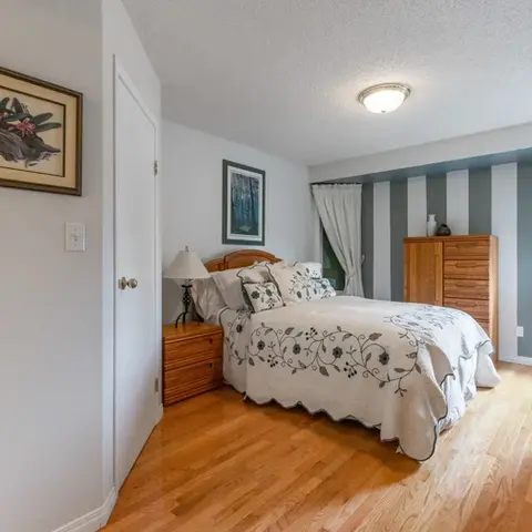 A decluttered master bedroom in a listing-ready Edmonton home.