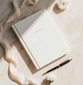 elegant_flatlay_of_a_closed_notebook_and_a_luxury_pen_minimalist_fine_art_composition_soft