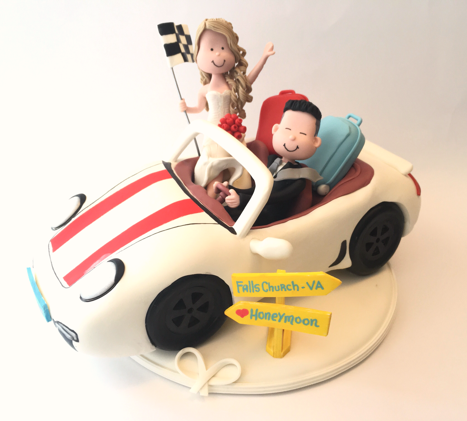 wedding-cake-topper-bride-and-groom-traveling-car