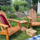 Thumbnail: Patio Wise 3-piece patio set in a backyard setting with a picnic blanket, featuring two acacia wood chairs and a matching side table in the middle. Perfect for outdoor relaxation and gatherings.