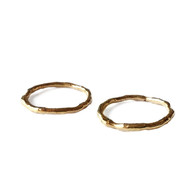 Gouden vloeiende ringen