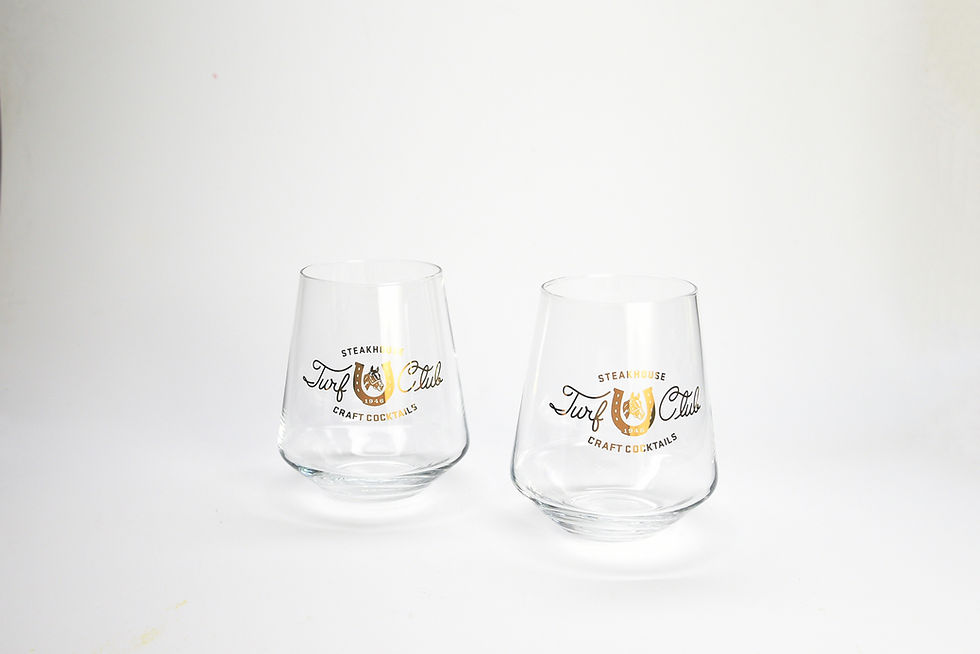 A pair of signature Turf Club stemless wine glasses
