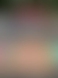 Three kids show off hand painted artwork