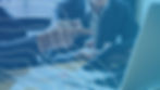 Gentlemen reviewing an ERP plan.