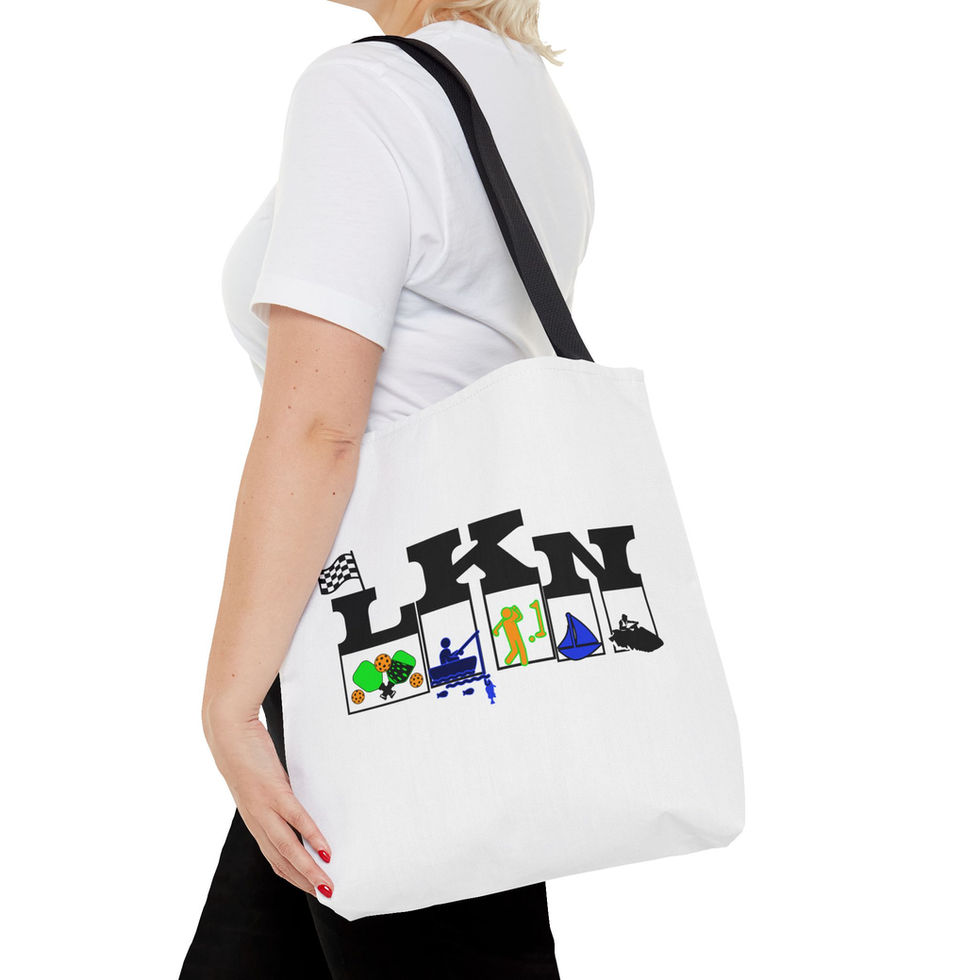 Woman holding white LKN tote bag with various activity icons
