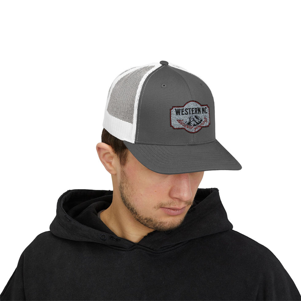 Man wearing gray Western NC trucker hat