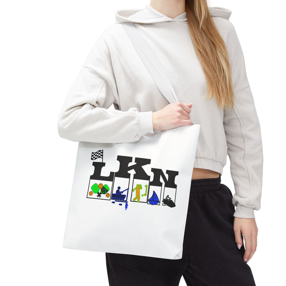 Woman holding LKN tote bag with lake activities