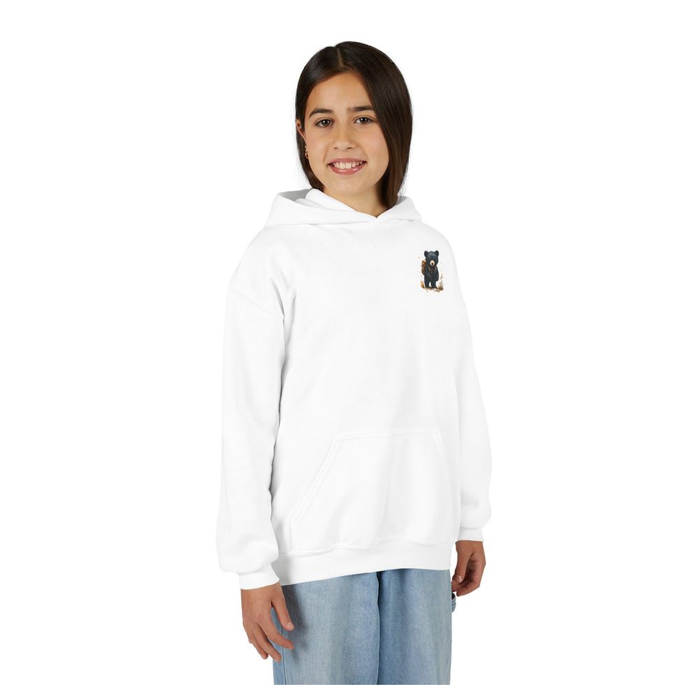 Young girl wearing white hoodie with small raccoon design; Kids Raccoon Camping Hoodie.