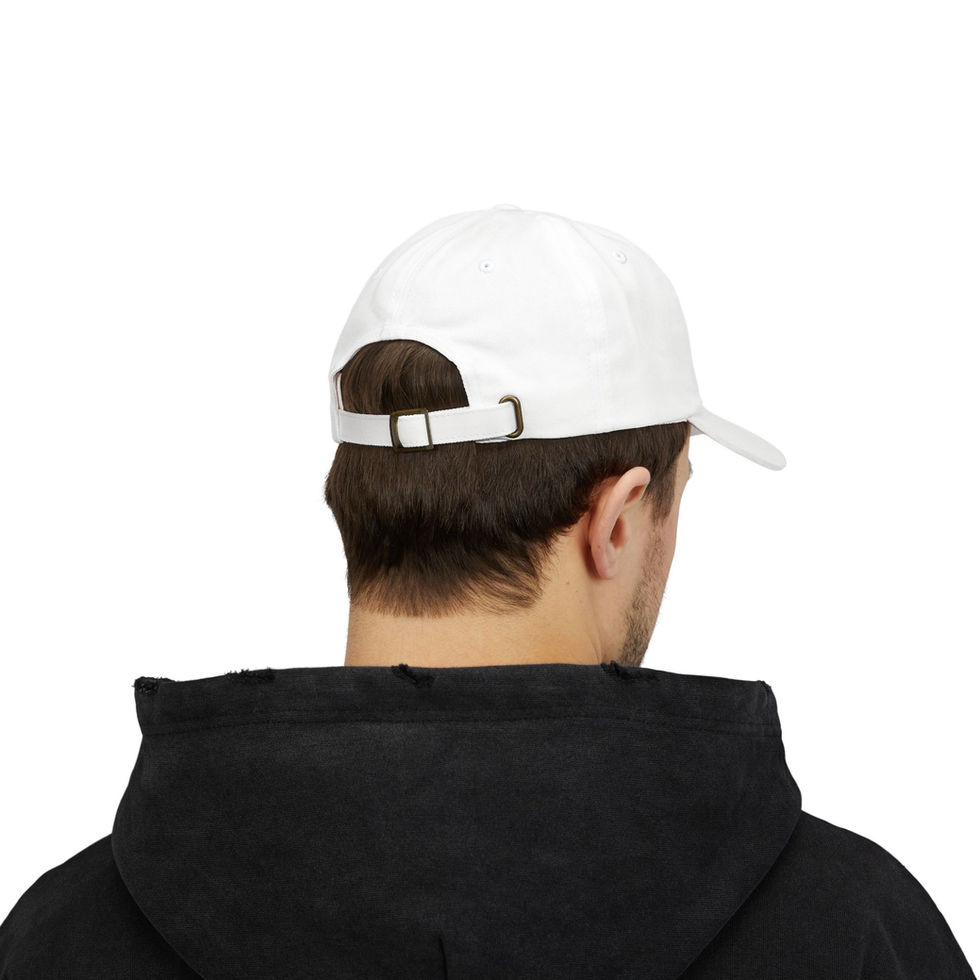 Man wearing white backwards baseball cap