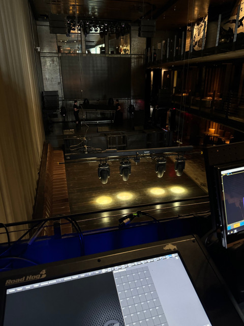 a road hog 4 monitor sits in front of a stage