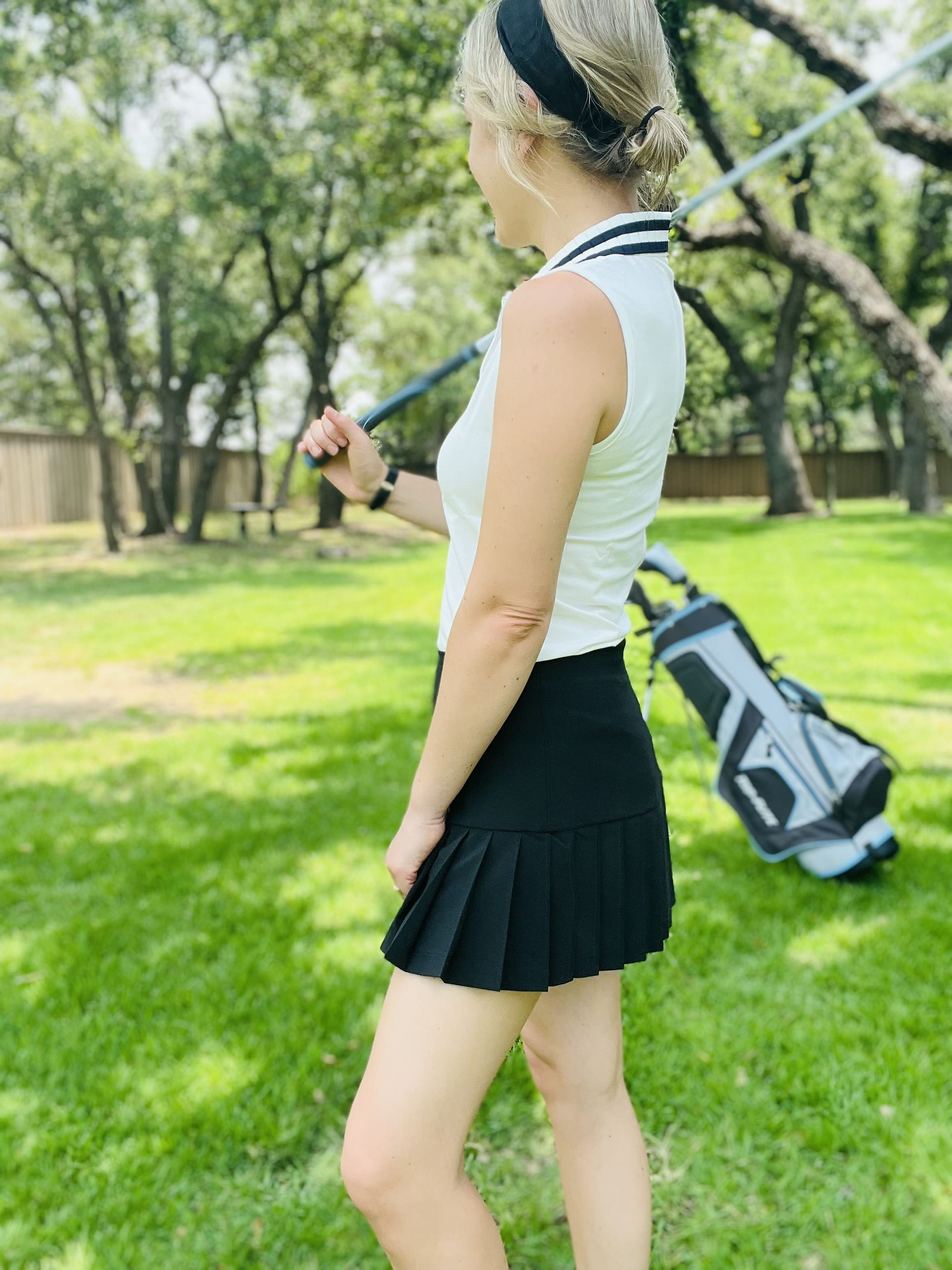 Austin personal stylist Natalie, owner of Closet Curator reviewing luxury sports wear by Tory Burch