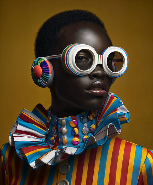 Striking Portrait of Individual with Colorful Attire.jpeg