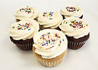 6 pack of assorted chocolate and vanilla cupcakes with sprinkles